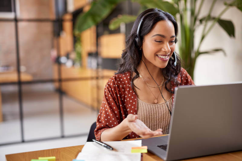 remote-brunette-woman-smiling-during-video-call